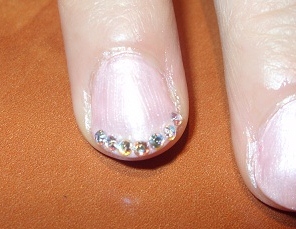 Pink bridal manicure with swarovski